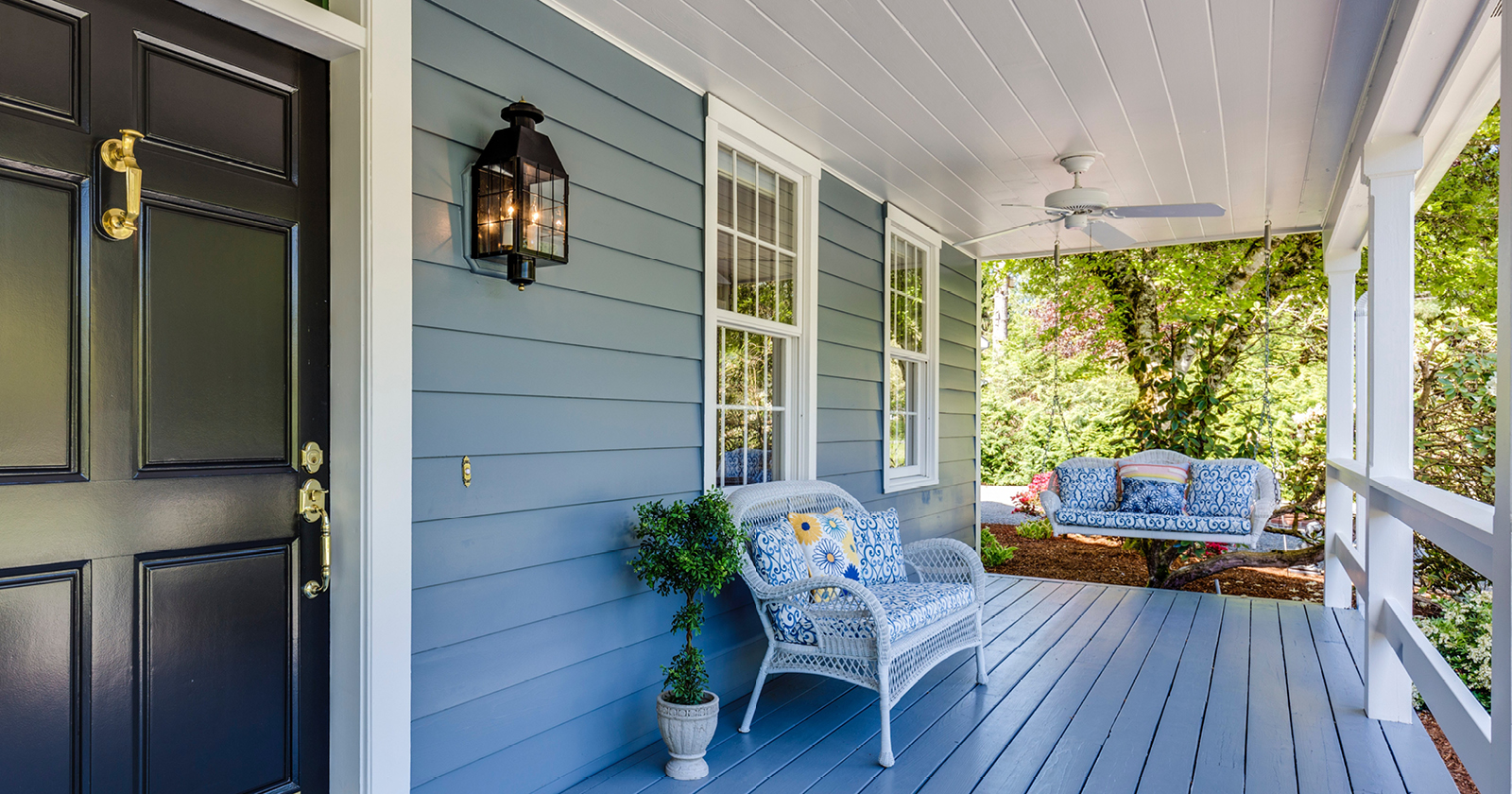clean porch with chair and swing